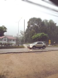 Car on road during rainy season