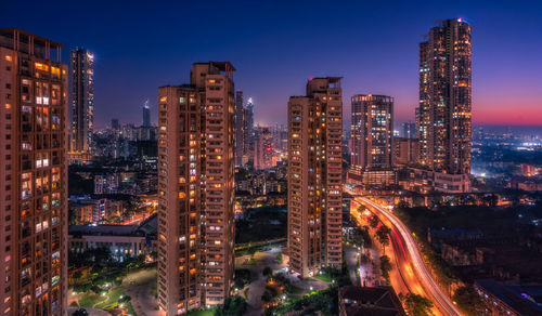 High angle view of illuminated buildings at night