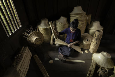 High angle view of man reading book