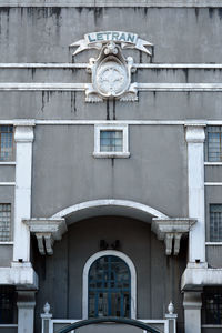 Low angle view of clock on building