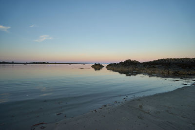 View of beach at sunset