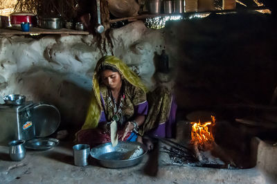 Rear view of young woman in traditional clothing