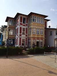 Buildings in city against sky