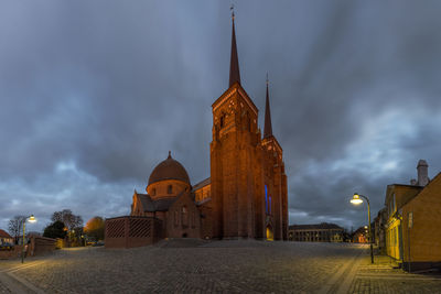 View of roskilde cathedral at dusk. built during the 12th and 13th centuries and on the unesco list