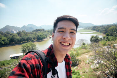 Portrait of young man smiling