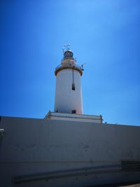 Low angle view of lighthouse against sky