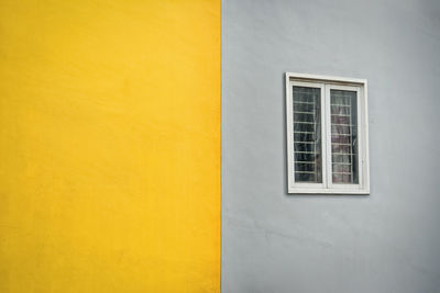 Full frame shot of yellow wall of building