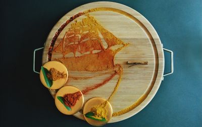 Directly above shot of spices on cutting board