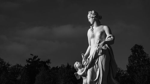 Low angle view of statue against sky