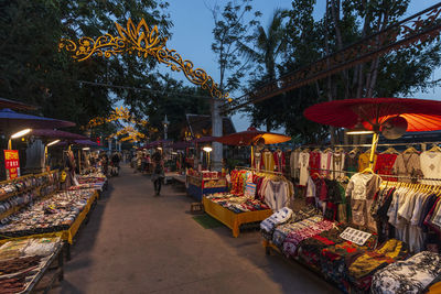 People at market stall