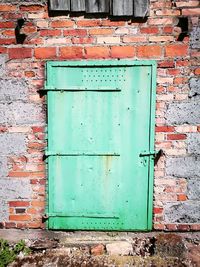 Blue closed door of old building