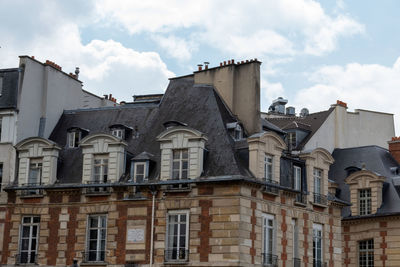 Low angle view of buildings against sky