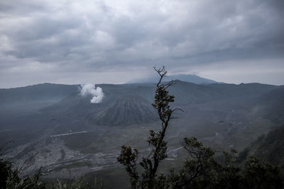 Scenic view of volcanic landscape against sky