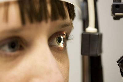 Girl having eye exam