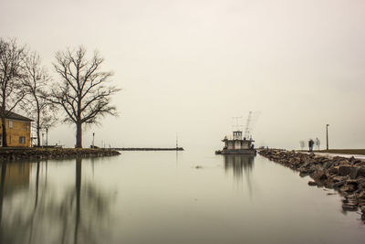 Scenic view of calm sea against clear sky