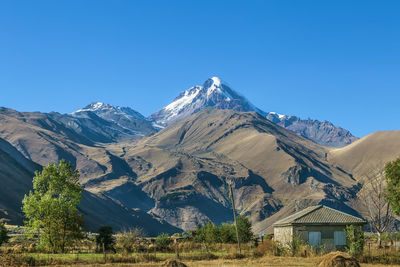 Landscape with mount kazbek from village sno, georgia