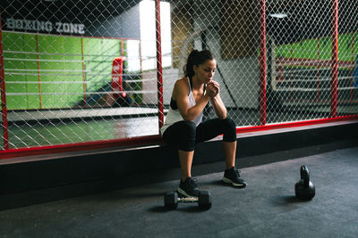 Woman exercising in gym