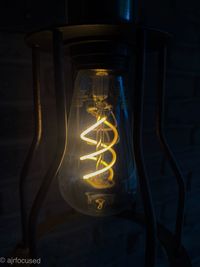 Close-up of illuminated light bulb