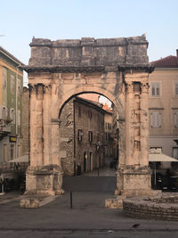 View of old building against sky pula city