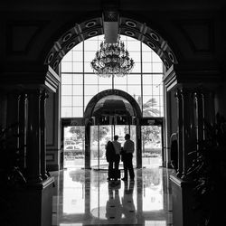 People in corridor of building