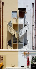 Low angle view of spiral staircase in building