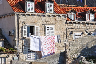 Clothes drying outside building in dubrovnik. laundry day