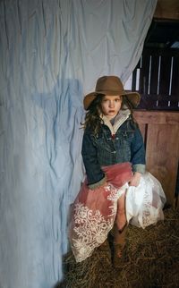 Portrait of cute girl wearing hat