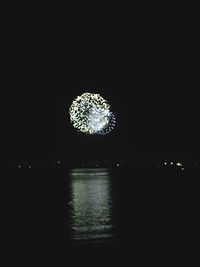 Firework display at night