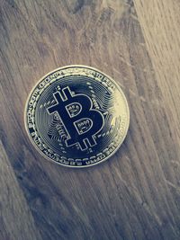 Close-up of coins on table