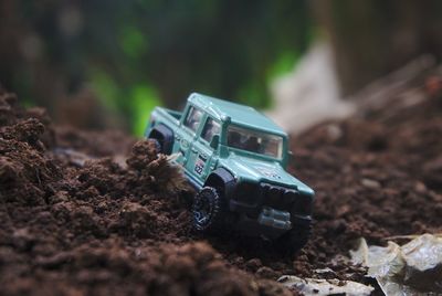 Close-up of toy car on field