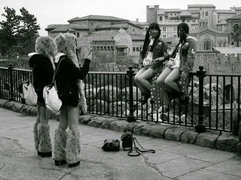 People sitting in town square