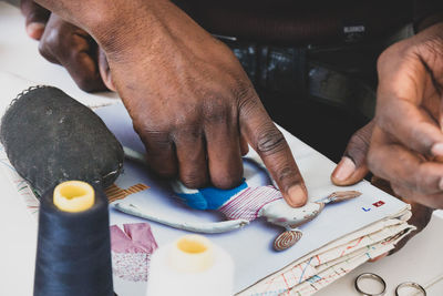 Close-up of man working on table