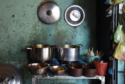 Food in containers on table at home