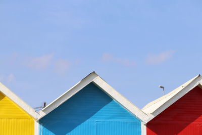 Low angle view of building against blue sky