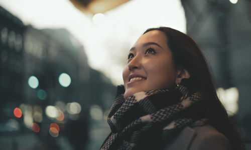 Portrait of a beautiful young woman in a street in wintertime