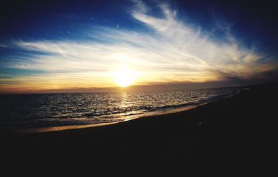 Scenic view of sea at sunset