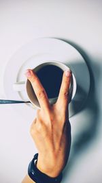 Close-up of hand holding camera