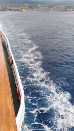 Low angle view of boats sailing in sea