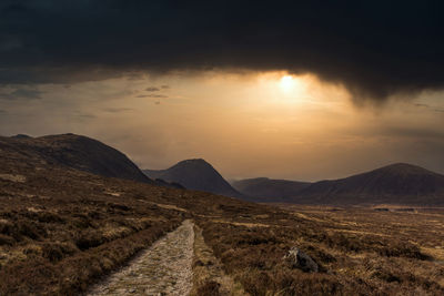 Scenic view of landscape against sky during sunset