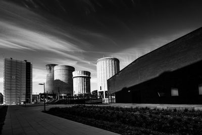 Low angle view of buildings in city against sky