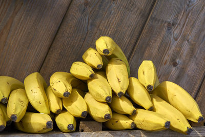 Directly above shot of bananas on wooden table