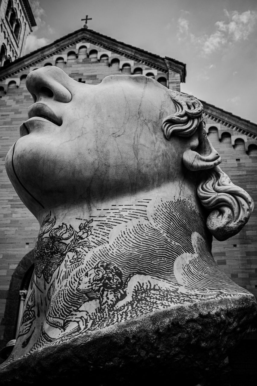 black and white, monochrome, architecture, monochrome photography, black, statue, sculpture, sky, built structure, history, the past, no people, craft, representation, white, nature, cloud, creativity, building exterior, art, travel destinations, low angle view, temple, religion, day, outdoors, monument, animal representation, darkness, temple - building, building, belief, old, ornate