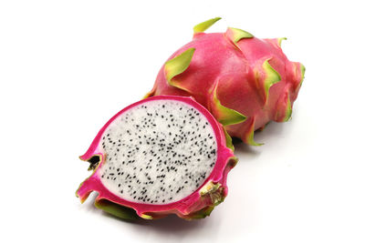 Close-up of fruits against white background