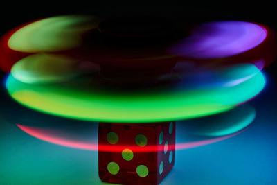 Close-up of illuminated lights on table