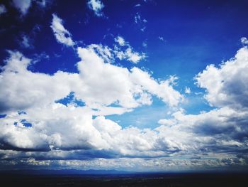 Scenic view of sea against blue sky