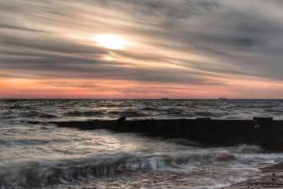 Scenic view of sea against sky during sunset