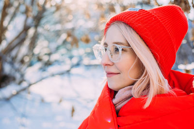 Portrait of beautiful young woman in winter