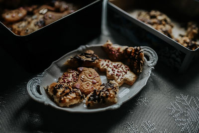 High angle view of cookies in plate on table