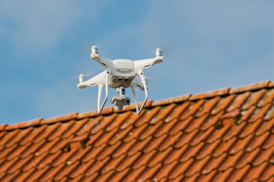 Low angle view of roof against clear sky