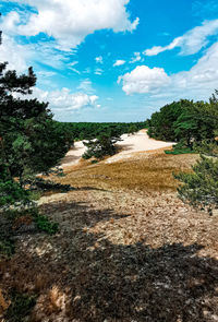 Scenic view of land against sky